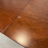 Dark Wood Table (1 Self Storing Leaf) DINING TABLE 56w40d29h